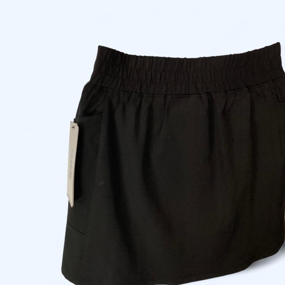 Black workout women's mini skirt with pockets RBX XS NWT